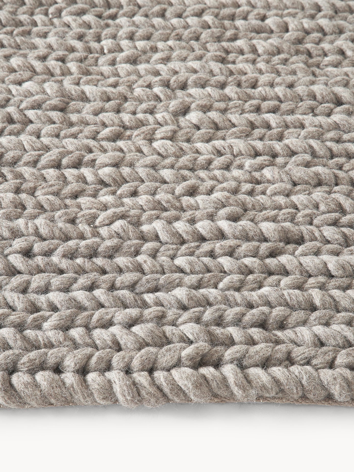 Bruna Handmade Rug in Wool with Braided Texture
