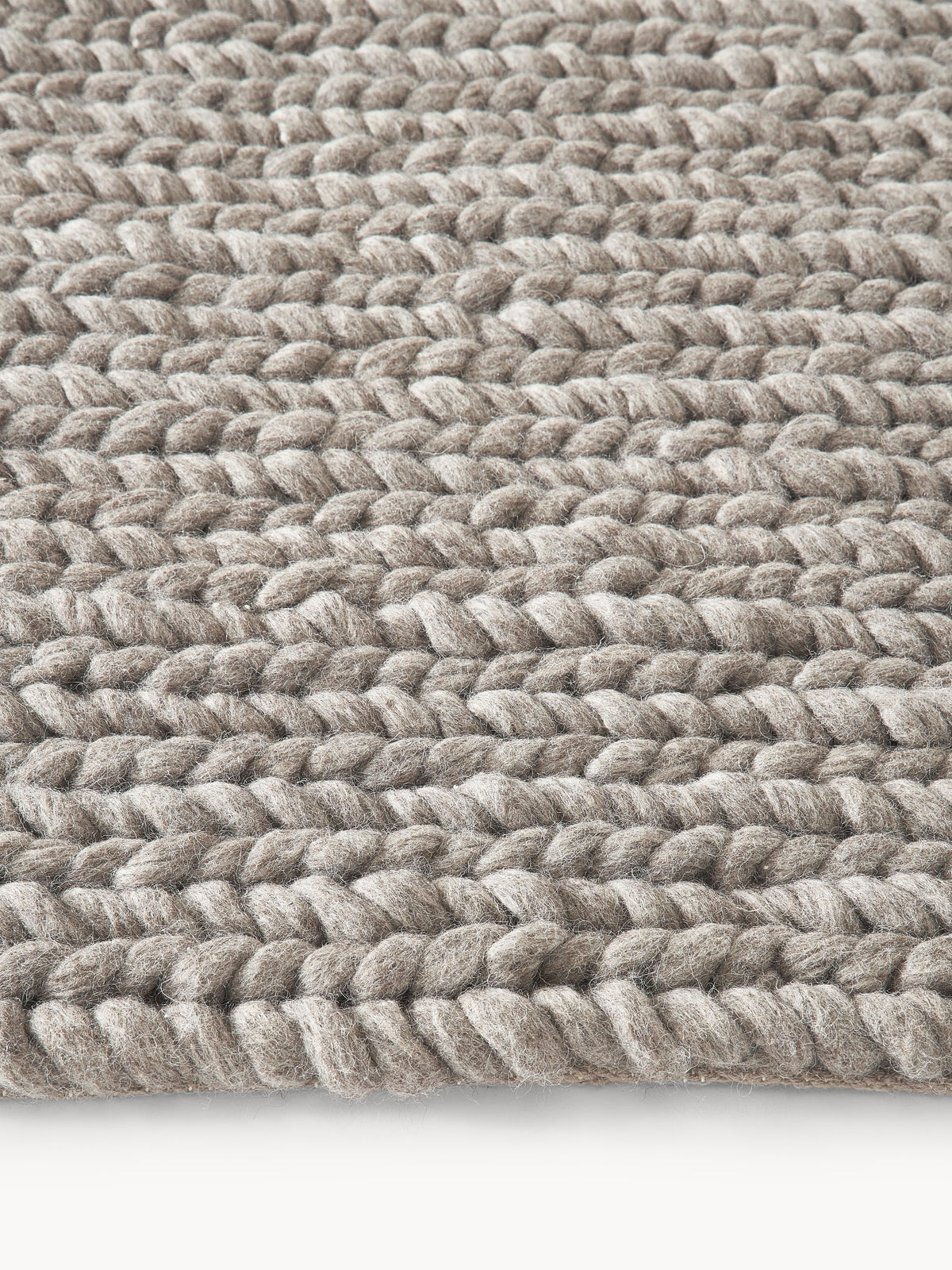 Bruna Handmade Rug in Wool with Braided Texture
