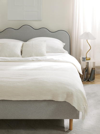 Romy Upholstered Bed, Wavy Headboard
