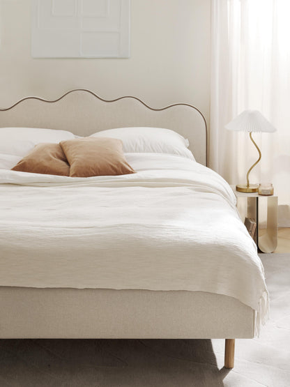 Romy Upholstered Bed, Wavy Headboard